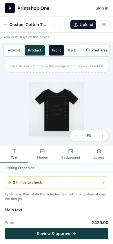 T-shirt designer on a phone showing the design on a black T-shirt with text, photo and layer tools